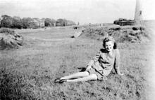 Air raid shelters on green