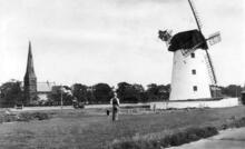 Air raid shelters on green